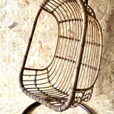 Vintage rattan hanging chair with its stand.