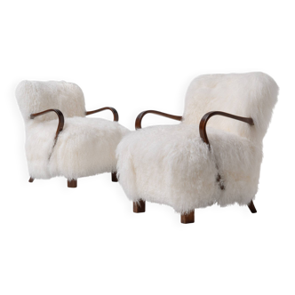 Paire de fauteuils Art déco en peau de mouton mongole, années 1950