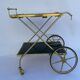 Vintage 1960's bar rolling table smoked glass gilded metal