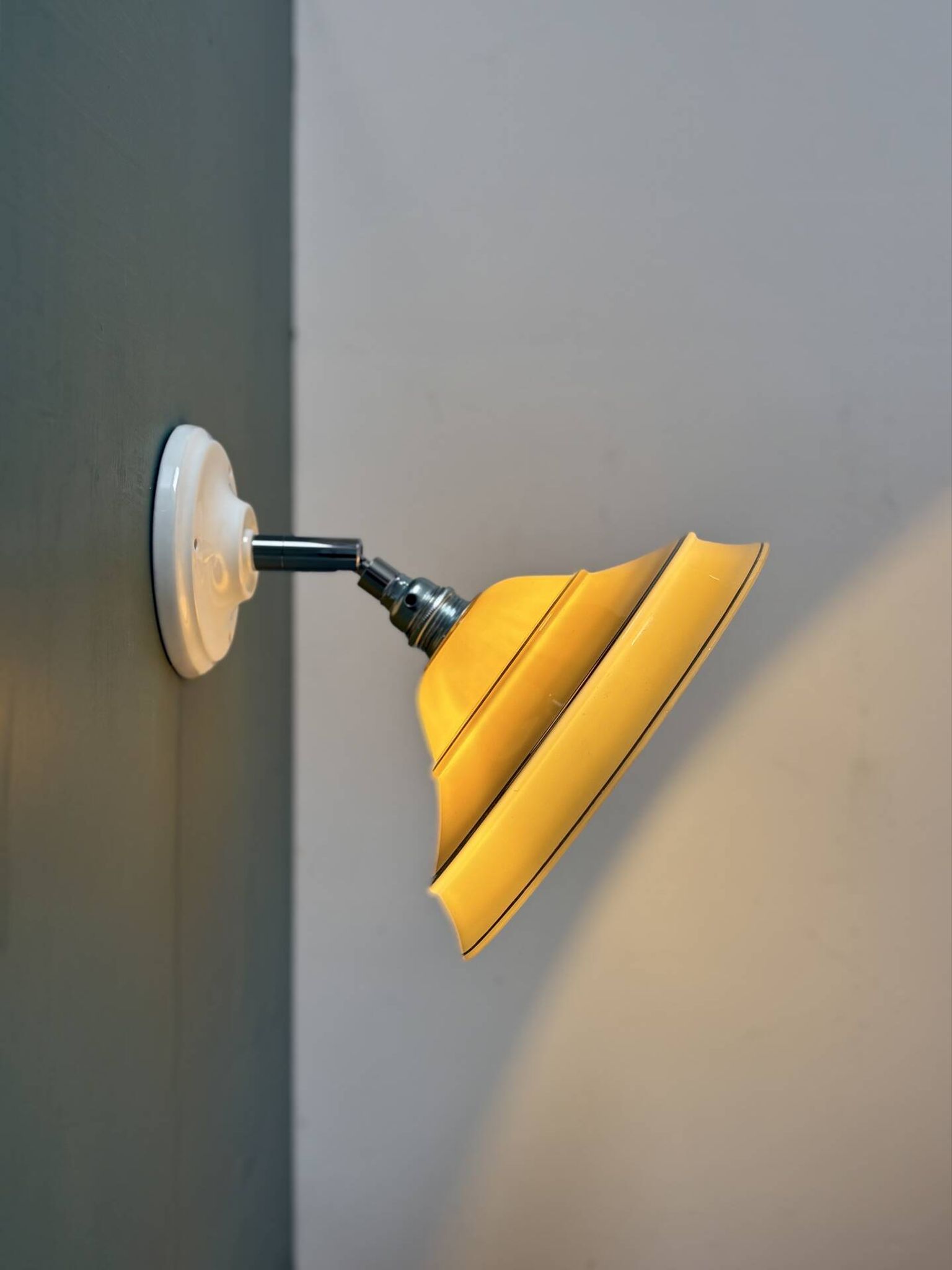 Vintage lampshade in yellow opaline with silver trim.