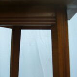 Art deco side table in varnished wood