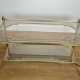 Rare bronze, brass, and steel mesh coffee table with a double glass top resting on a brass mesh. French work by Jansen