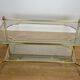 Maison Jansen coffee table in bronze, brass, steel lattice, and glass, France.