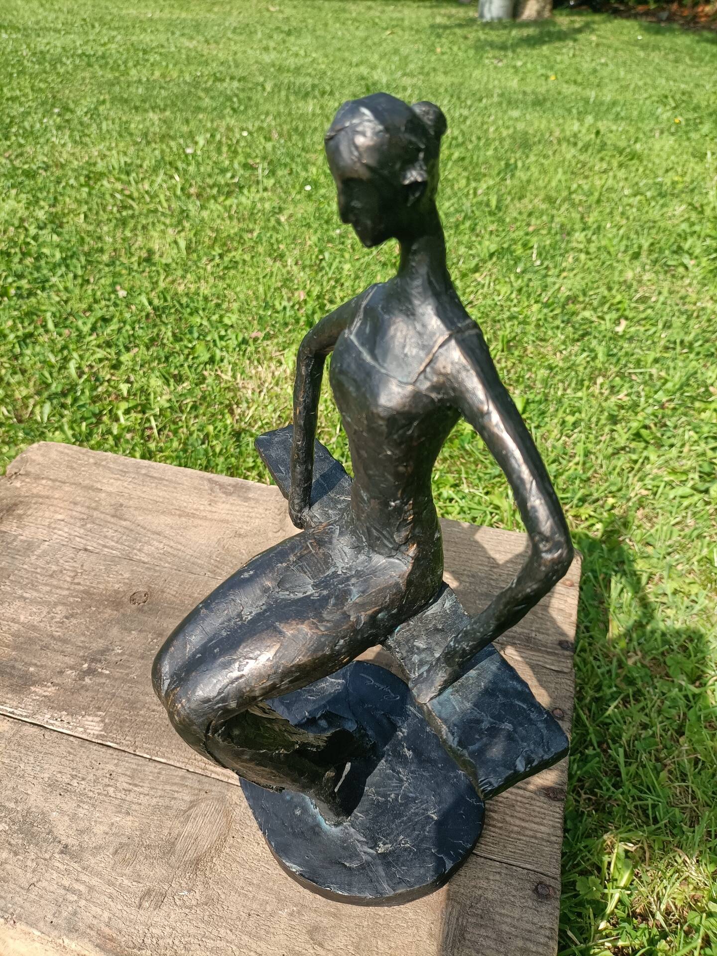 Sculpture of a dancer on a swing signed by Raphaël