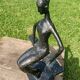 Sculpture of a dancer on a swing signed by Raphaël