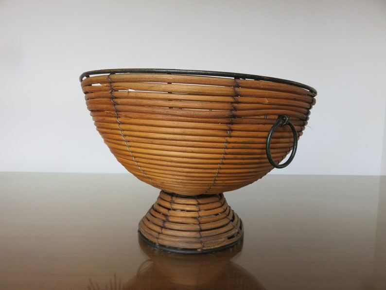 Standing fruit basket in rattan and black lacquered metal 1970