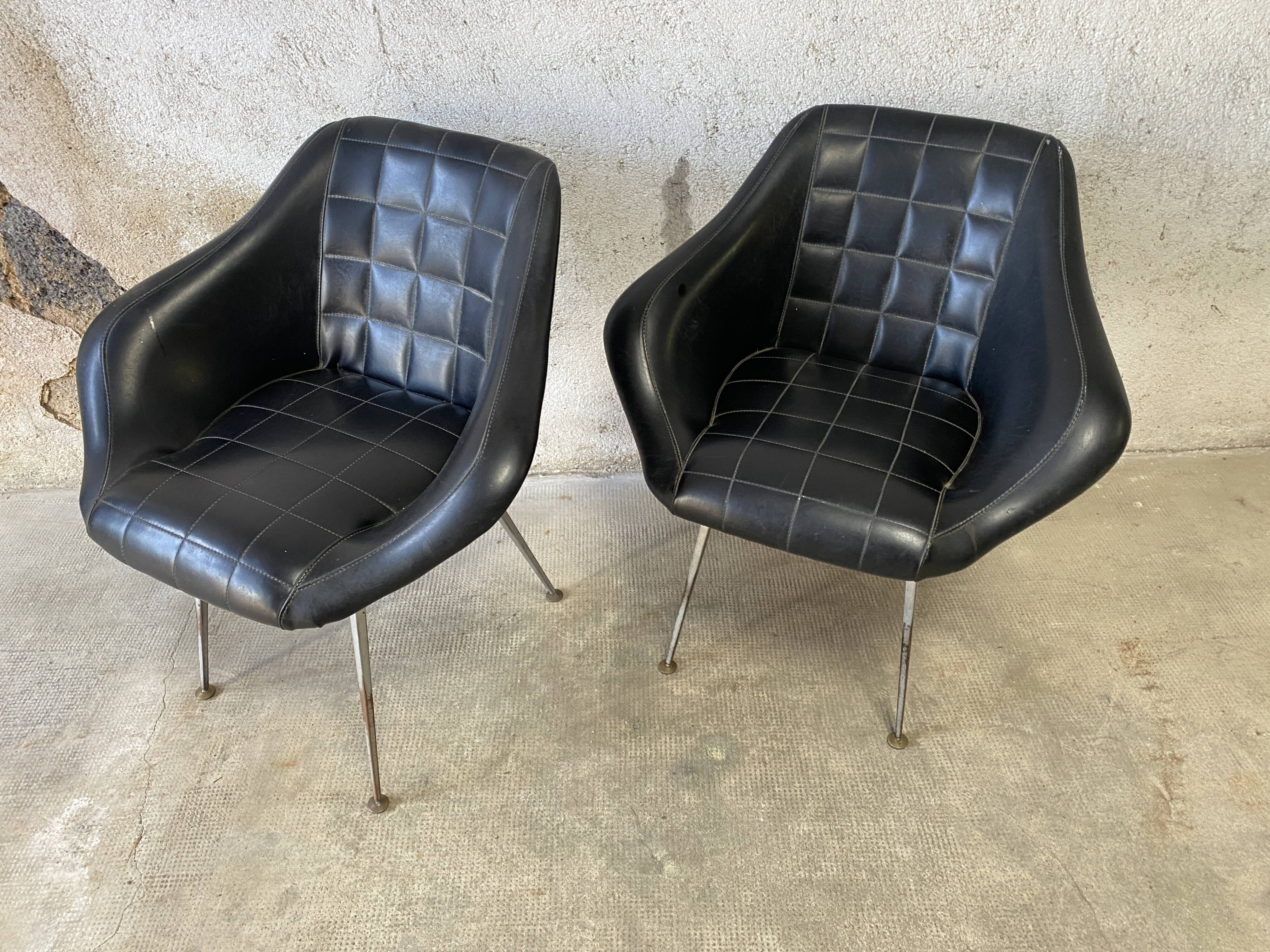 Pair of upholstered armchair year 60