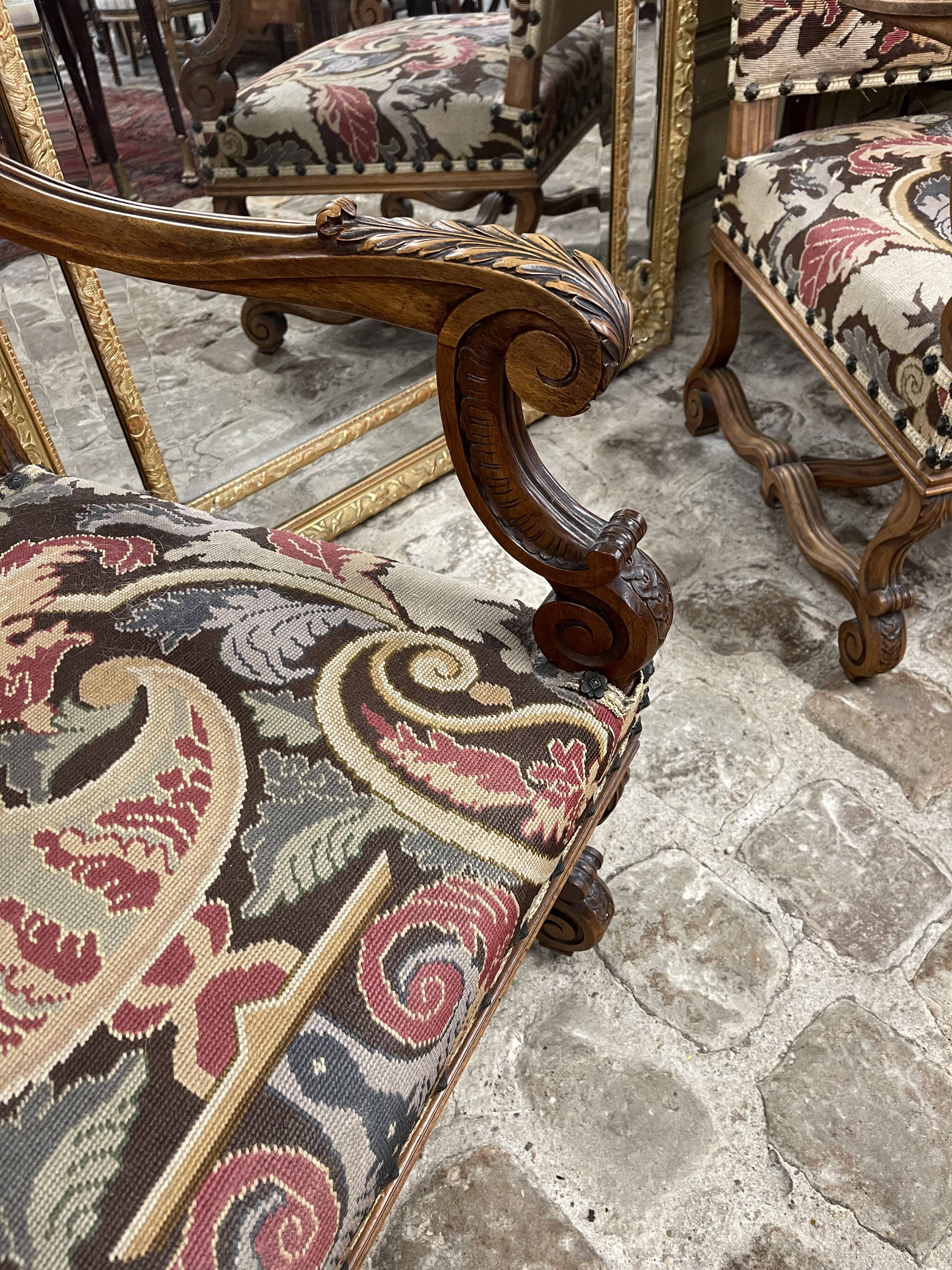Pair of flat-back armchairs in walnut, Louis XIV style.
