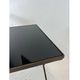 Modernist nesting tables in metal and black glass, 1950s.