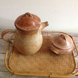 Teapot in reeds and its sugar bowl