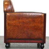 Sheepskin Art Deco design armchair with wood and beautiful cognac-colored leather