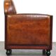 Sheepskin Art Deco design armchair with wood and beautiful cognac-colored leather