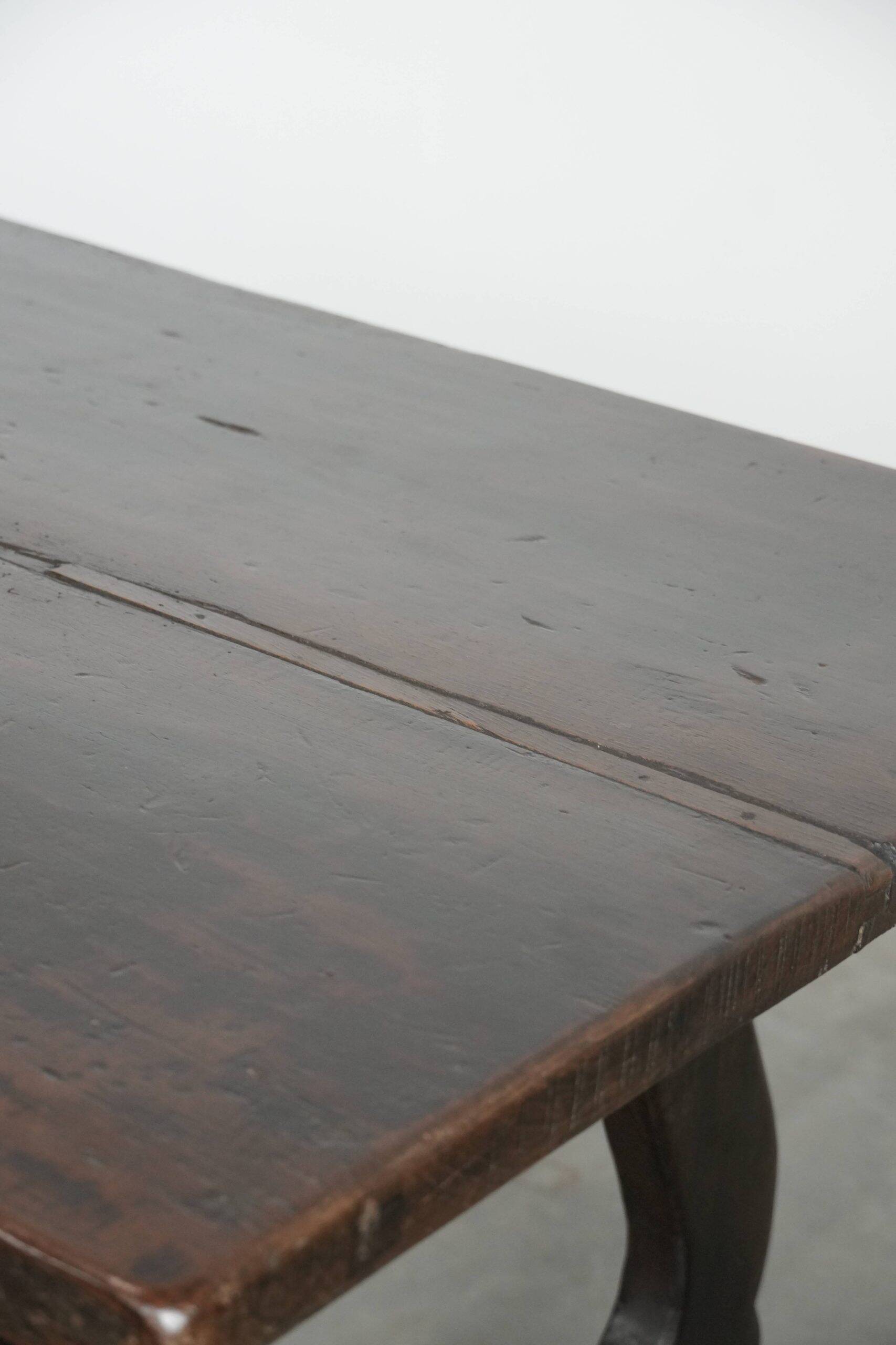 Antique Spanish table from the early 18th century with  a cast iron base