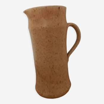 Beige pitcher