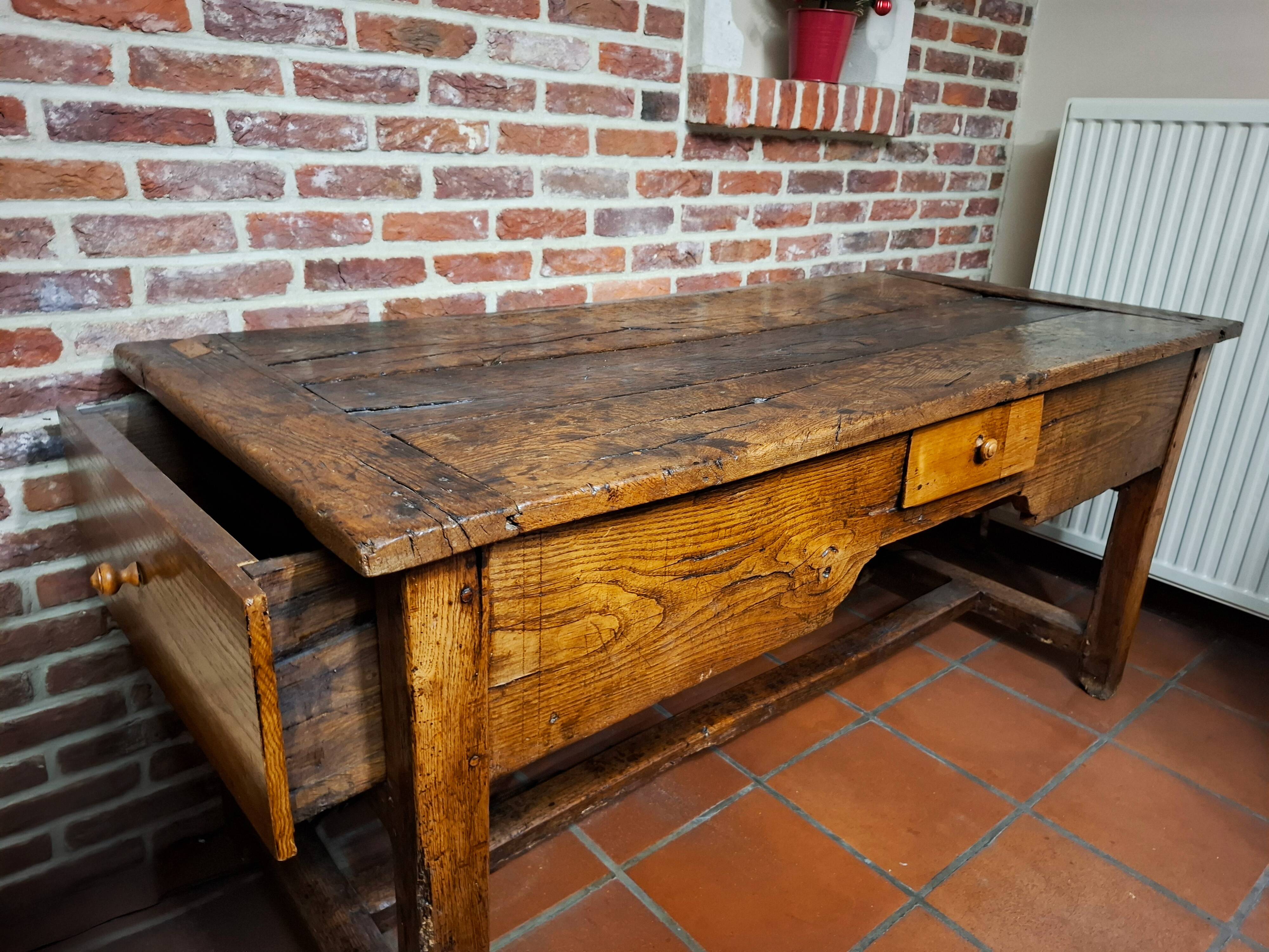 Antique desk accompanied by its chair – first half of the 18th century.