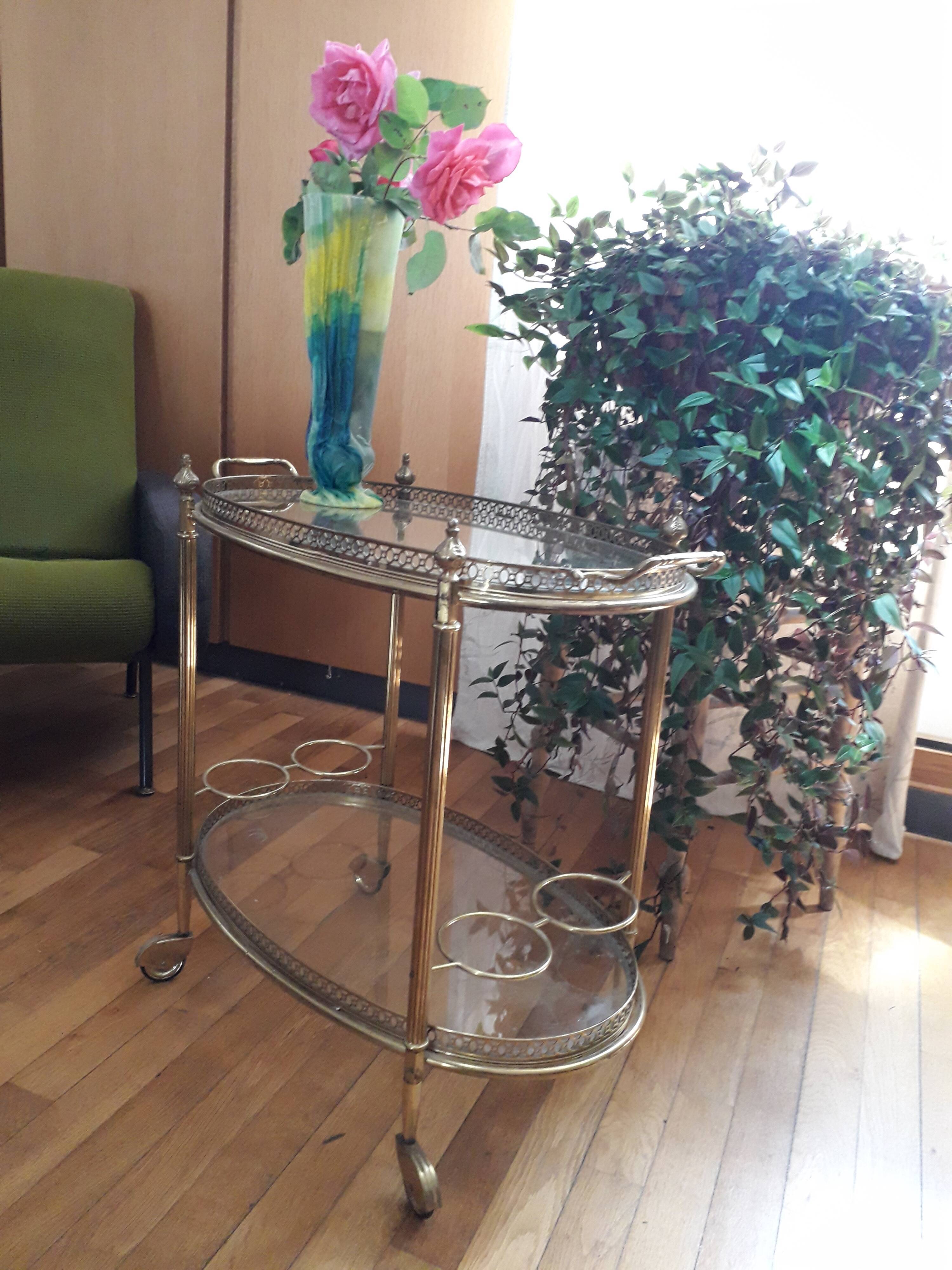 Dessert on brass wheels and glass door bottles year 60