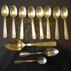 11 silver spoons with punches