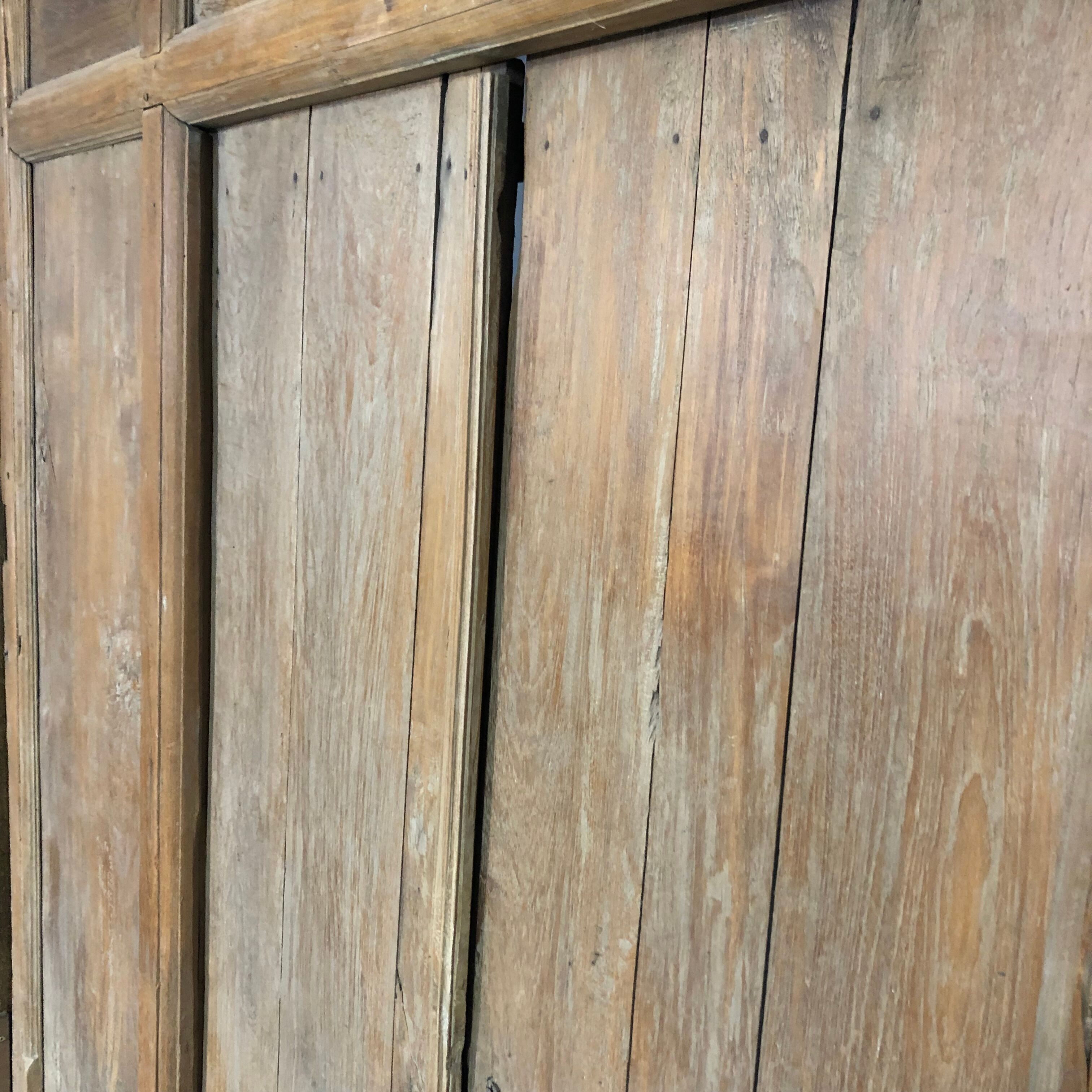 Old wooden door with its frame