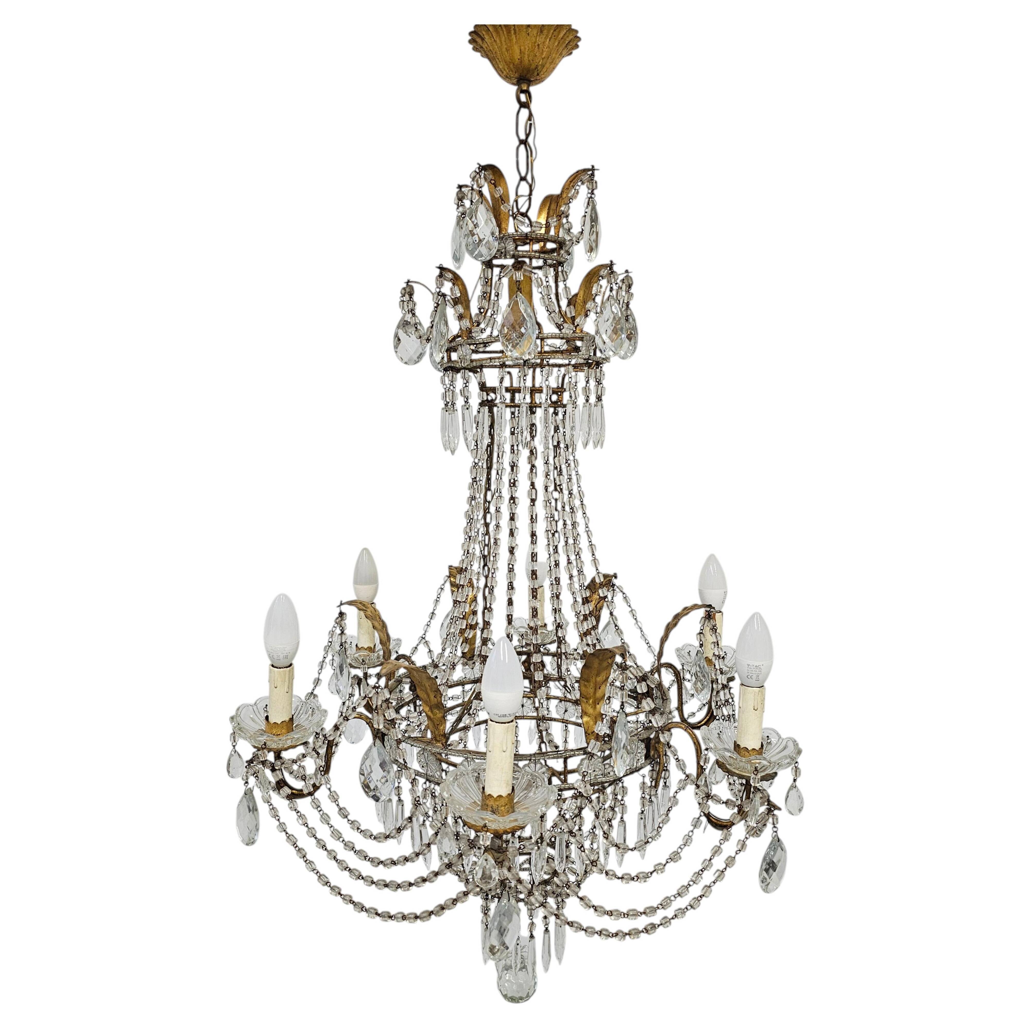 Antique crystal chandelier with floral details 1910