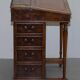 Davenport desk in walnut with leather and vintage brass gallery.