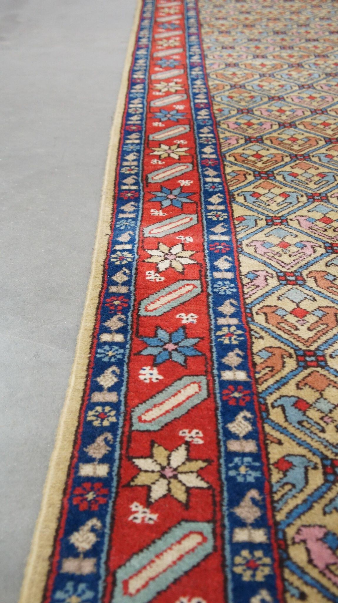 Colorful oriental runner with contrasting borders and cozy patterns, measuring 314x92 cm