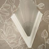 Pair of Art Deco wall sconces in plaster and pressed glass.