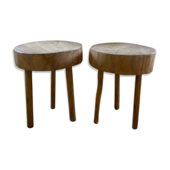Pair of stools of tripod v with raw wood seat