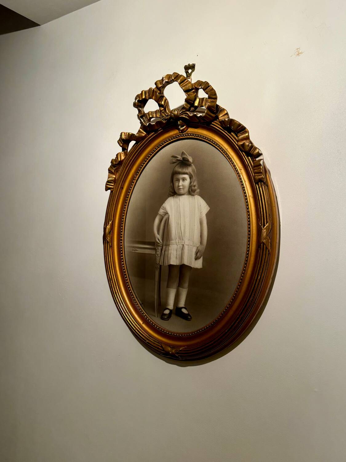 Old photograph, young girl with ribbon, 19th century