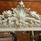 Louis Philippe mirror with patinated cartouche