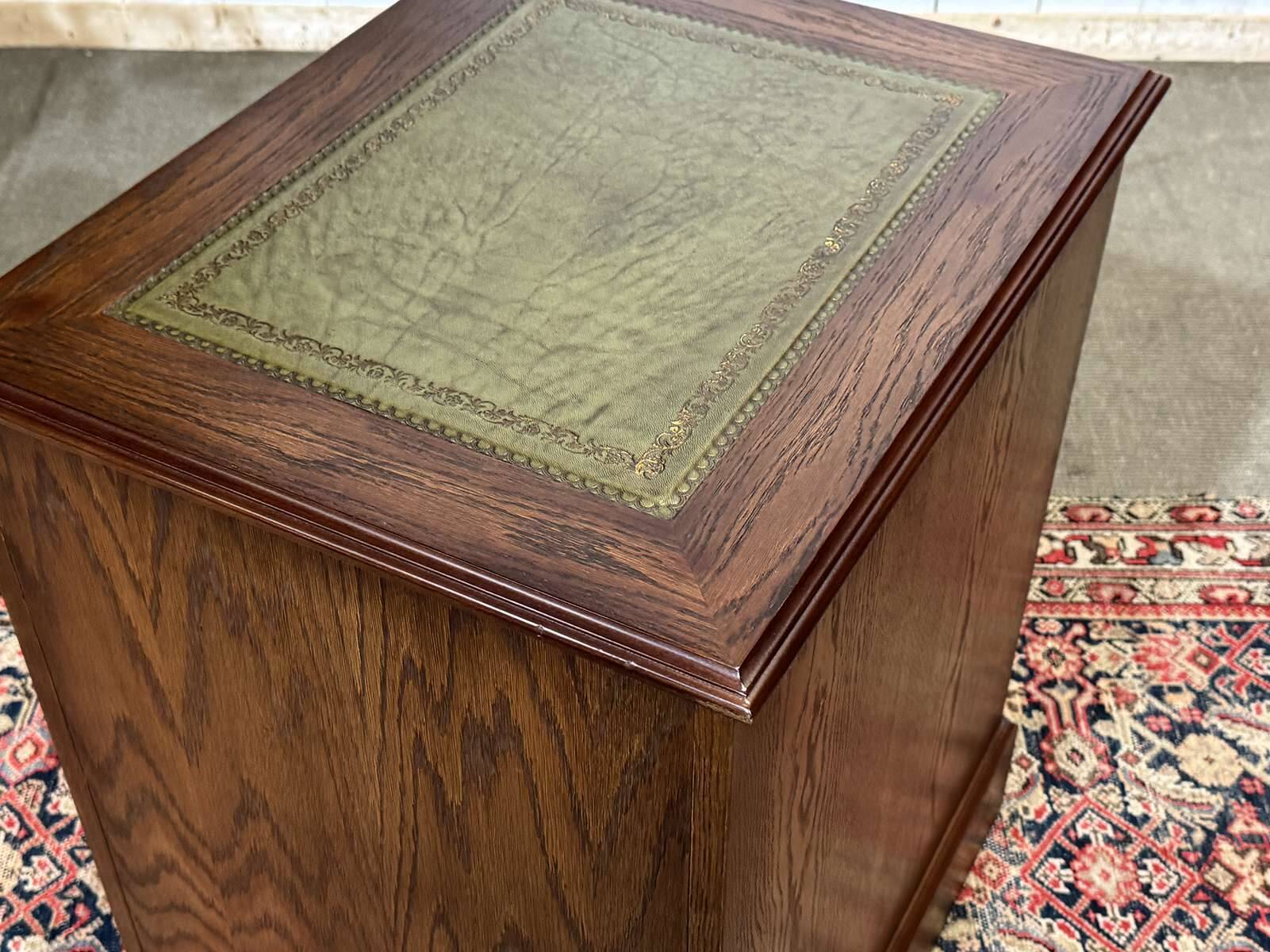 Office cabinet in oak with English leather top from the 1990s.