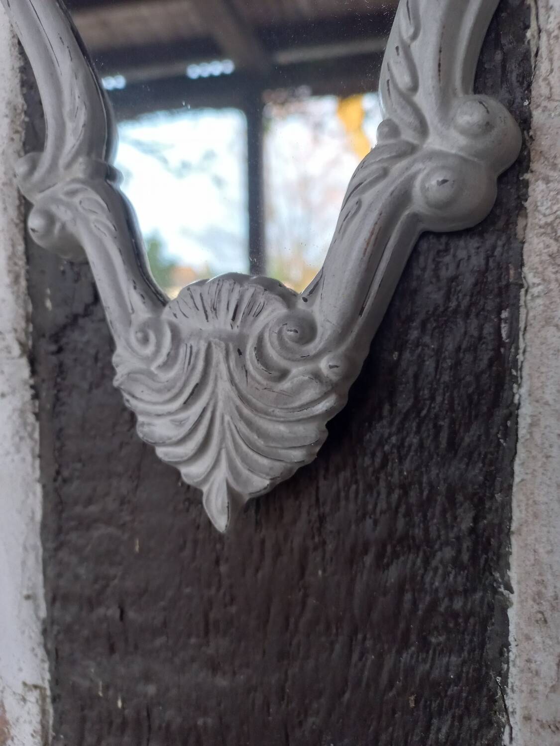 Small patinated baroque mirror