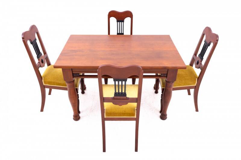 Table with four chairs from the early 20th century