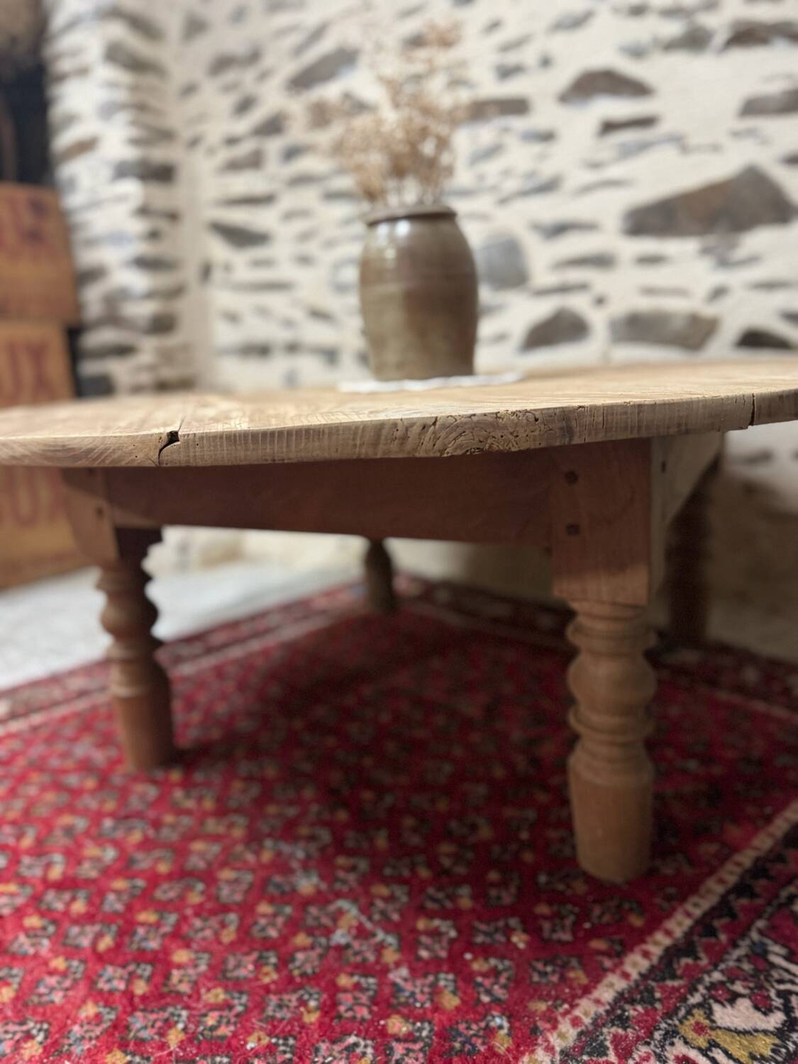 Oval coffee table in raw wood