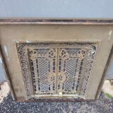 Front of the old fireplace all in bronze