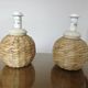 Pair of bedside lamps made of woven sea rush, matching lampshades, 1980.
