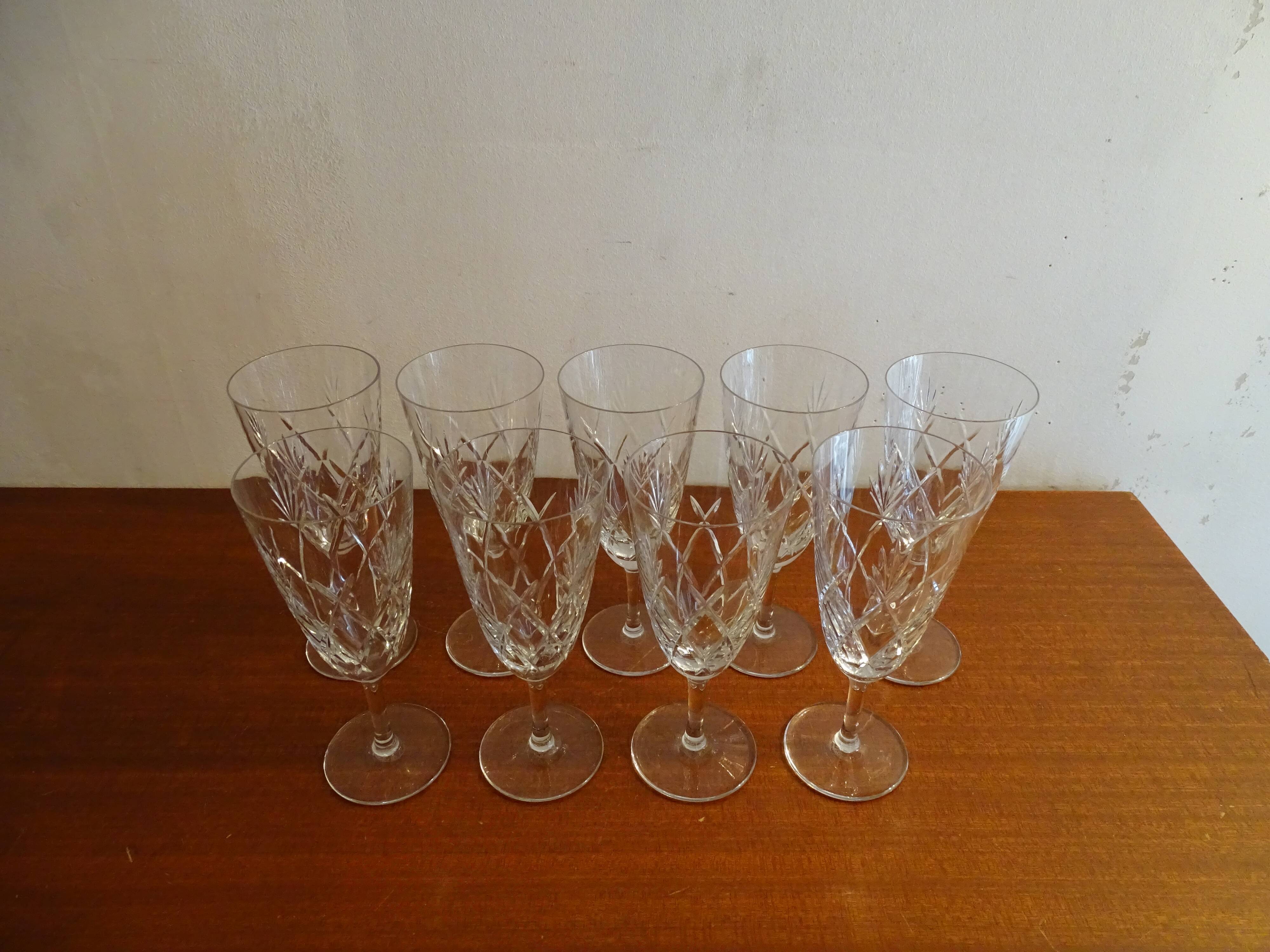 9 Bayel crystal champagne flutes signed, cut crystal.