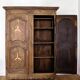 Antique French rustic wardrobe with star inlays.