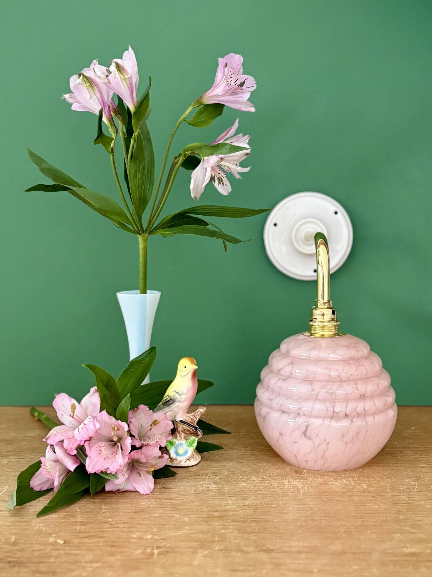Vintage pink Clichy glass globe wall light.