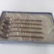 Old box with five spoons