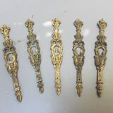 Set of five bronze lock entries