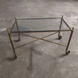Rolling coffee table in vintage gilded bronze