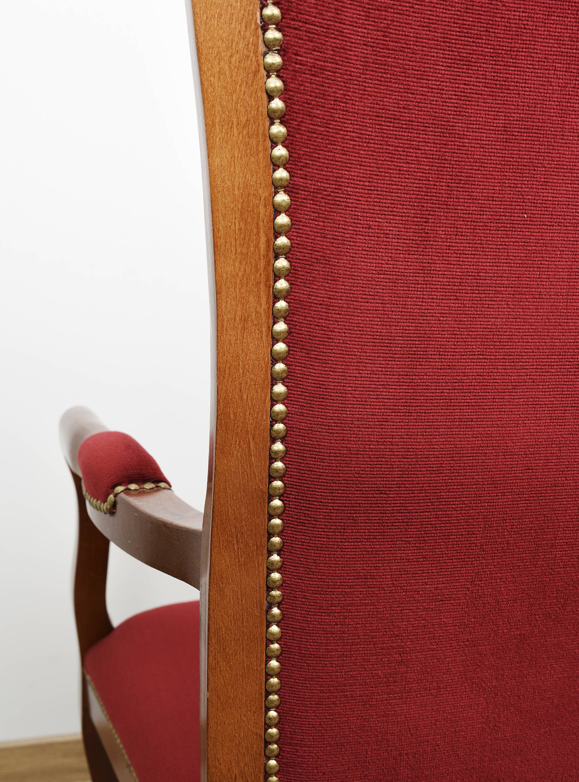 Burgundy Voltaire armchair