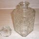 Antique whisky decanter made of chiseled glass