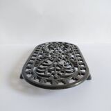 Large vintage black cast iron trivet