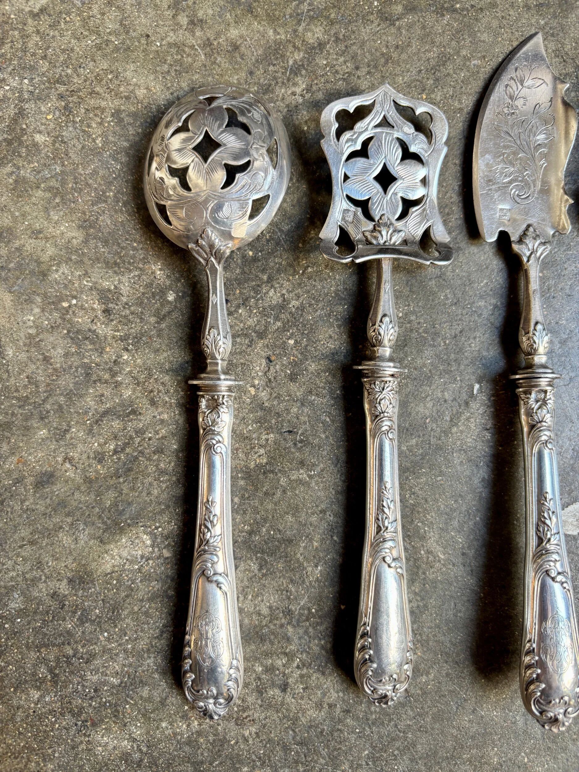 4 silver bonbon spoons engraved "HS"