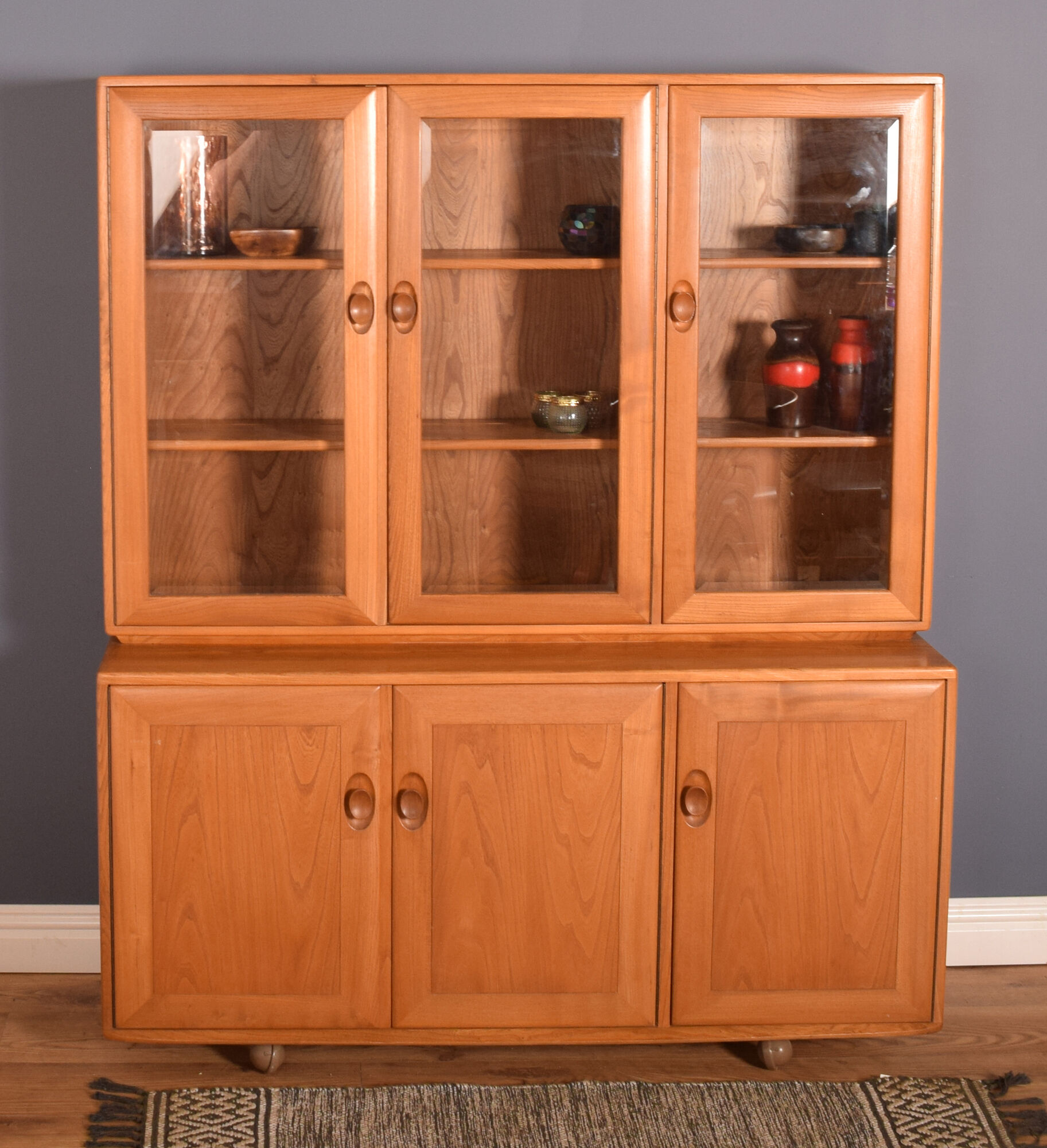 Ercol elm windsor model 806,803 glazed three door cabinet dresser