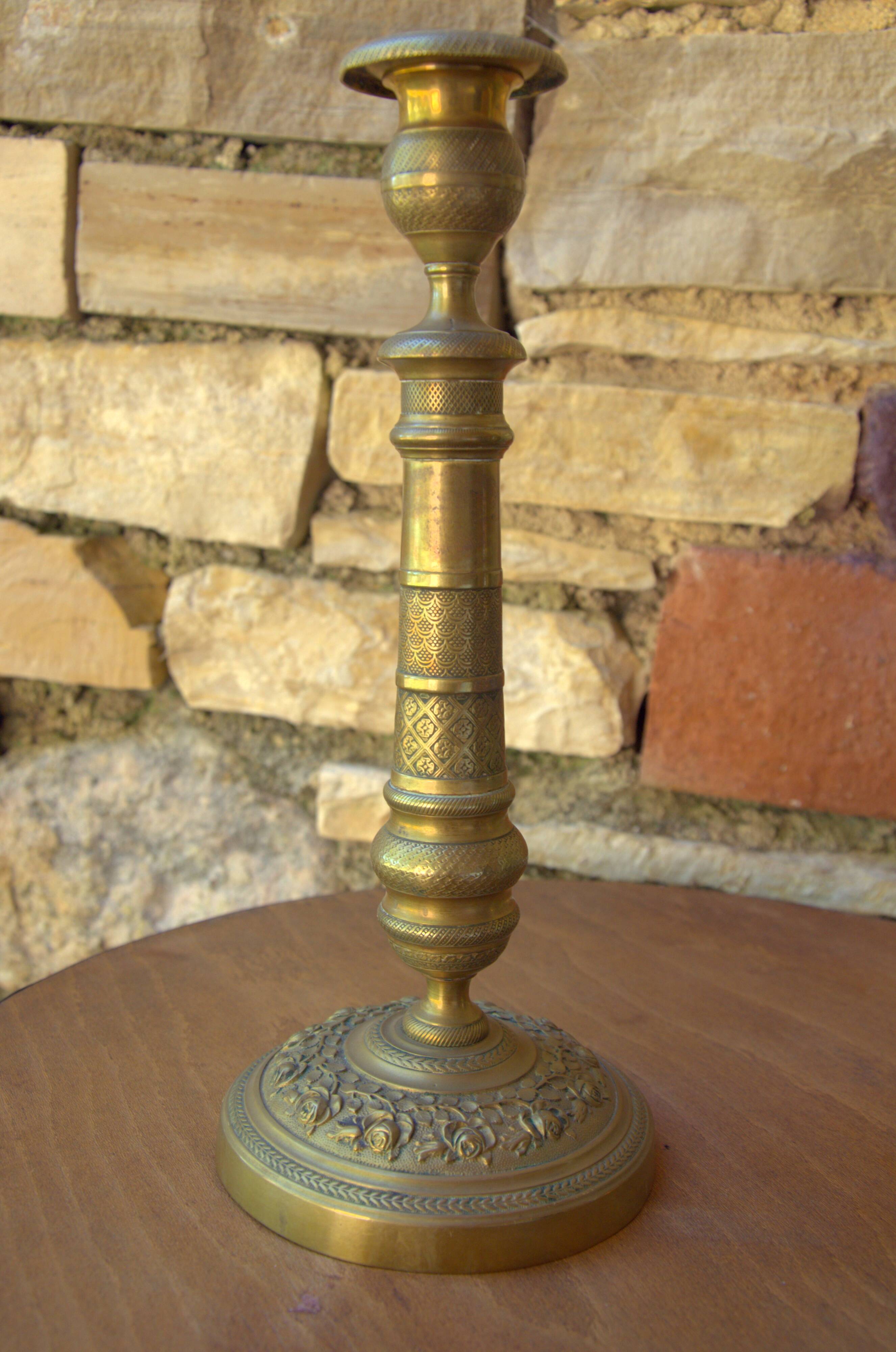 Pair of French neoclassical brass candlesticks, 19th century, 12x29cm