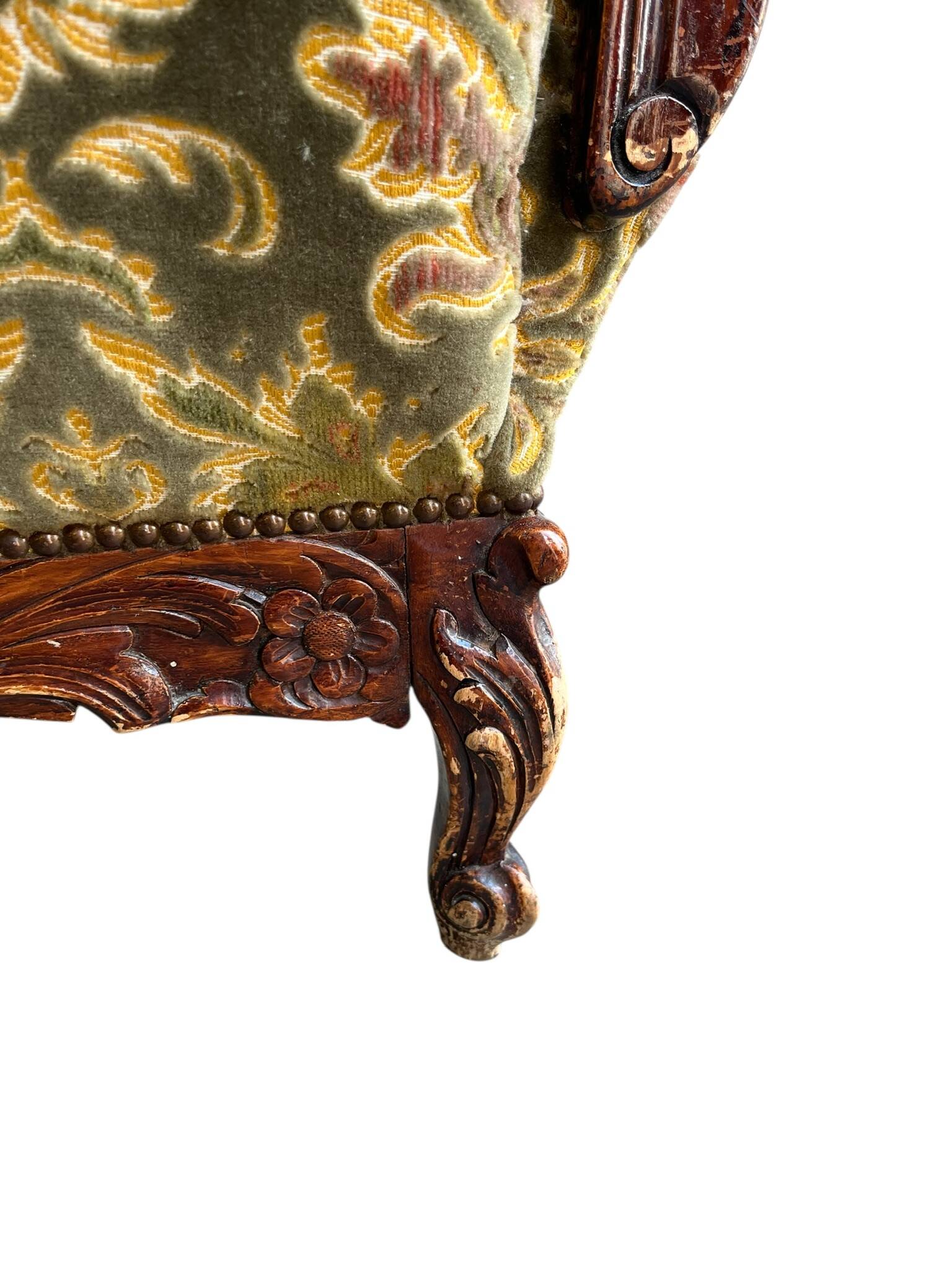 Vintage baroque chair with a rich floral pattern