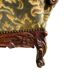 Vintage baroque chair with a rich floral pattern