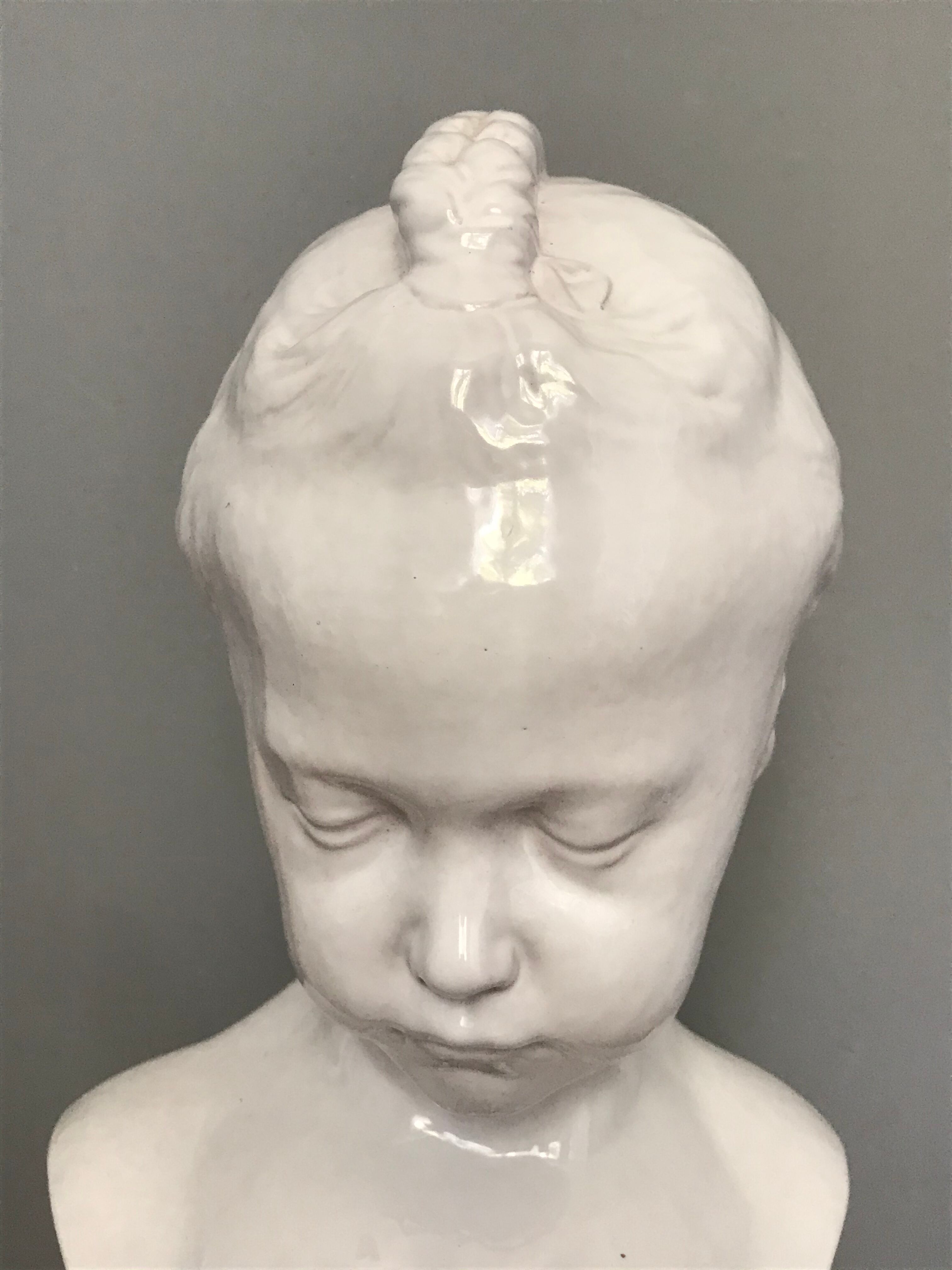 Child bust in enamelled terracotta